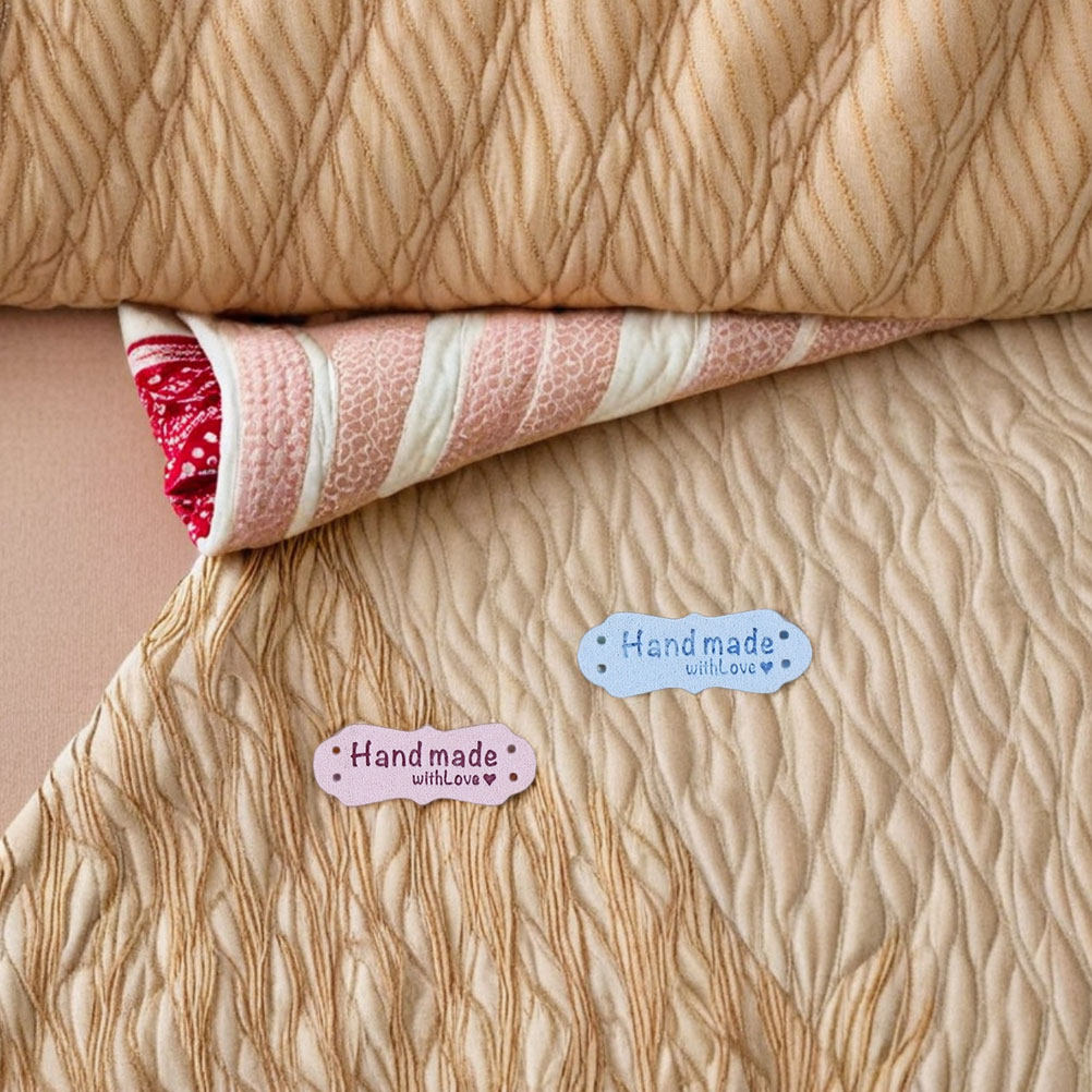 Sewing Labels - 100 Etiquetas de Gamuza Hechas a